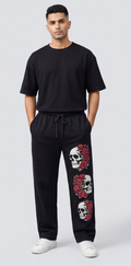 Black Triple Skull Rose Graphic Streetwear Trackpants | Men